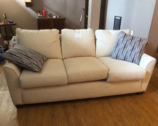 House 1: Like-new ivory couch