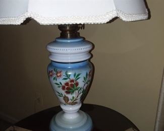 Unique hand painted design on fine china lamp set.