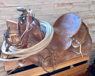 Vintage saddle and rope