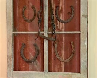 Handmade horse shoe and wood fence art work
