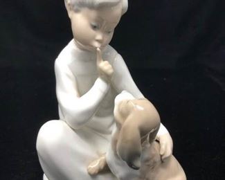 Lladro - Child with Puppy https://ctbids.com/#!/description/share/165429