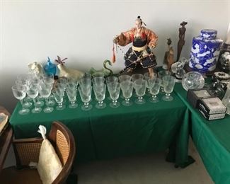 Crystal wine glasses, oriental doll sculpture