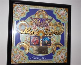 Aerosmith band signed plaque