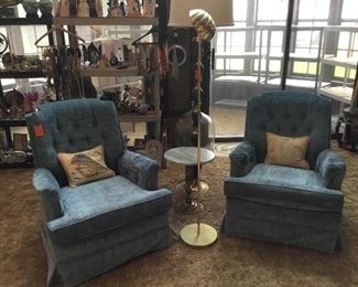 Pair of swivel blue velvet chairs 