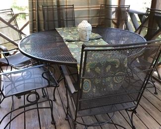 Wrought Iron Bronze (espresso) color patio set with 6 chairs; 2 are bouncy seat. 