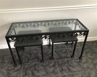 Glass table, seats -- matches large mirror