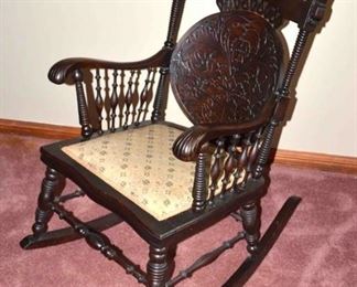 ANTIQUE CARVED BACK ROCKER