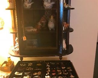 Wall mounted curio cabinet and costume jewelry!