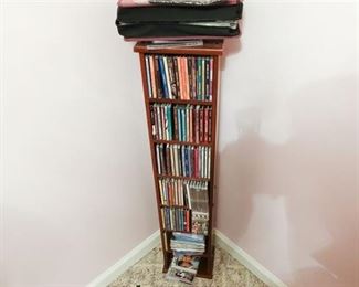48. Lot of DVDs plus storage case and display tower