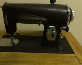 Sewing machine in cabinet