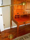 Brass adjustable floor lamp is near the Plantation Desk.