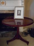 BAKER 33" round table on single pedestal base with 1-l/2" deep rim.  A framed original photograph by photographer/client is on the table.  There are additional photos available as well.