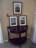 BAKER demilune table measures:
36" wide x 18" deep x 30" tall.

Three original framed photos by photographer/client are also shown.