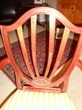 A close-up view of the BAKER shield back arm chair.