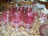 VINTAGE CRANBERRY SET WITH LOTS OF SAUCERS, ETC