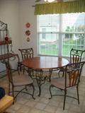 Wood and Wrought Iron Table with 4 chairs