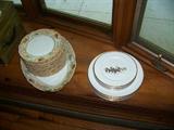 several complete sets of fine china