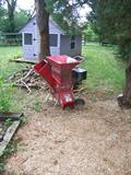 Wood Chipper and Riding Mower by Cadet