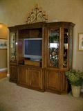 Entertainment Center and TV-- Some colors of the wood may appear lighter than they are due to lighting