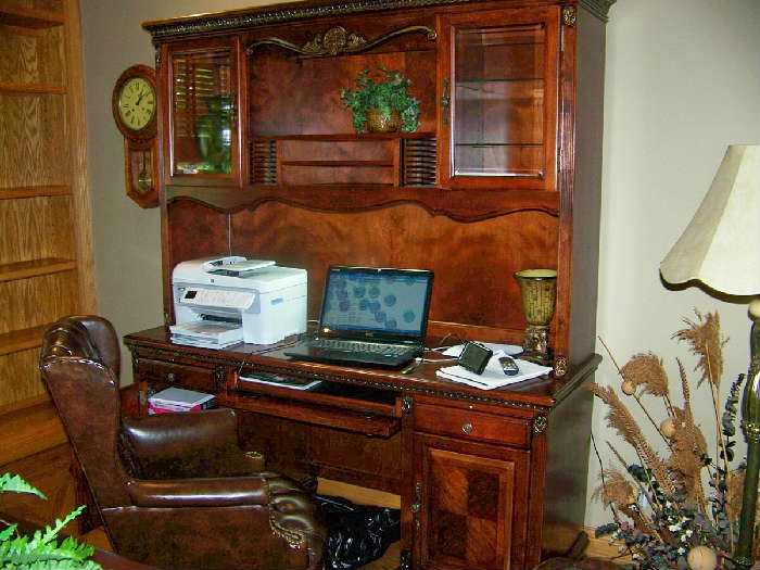 Esecutive Office furniture includes, cedenza, desk and file cabinet