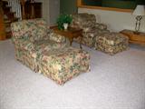 Matching pair easy chairs with ottomans