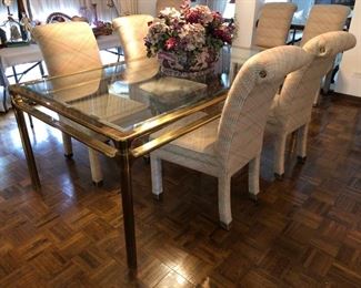 Glass and brass dining room table with 8 total chairs!