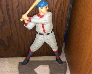 Iron baseball player doorstop 