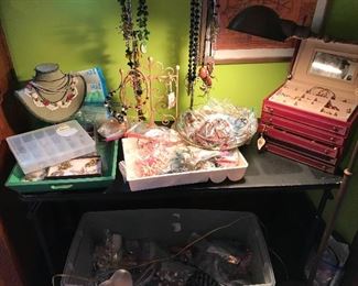 Lots of jewelry and cool brass lamp