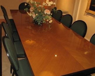 Large Lucien Rollin dining or conference room table.  Easily seats 12.   There are 2 additional leaves that can be added to the ends, extending the table further.  The leaves are in a custom wood case.  Includes table pads and table cloth.