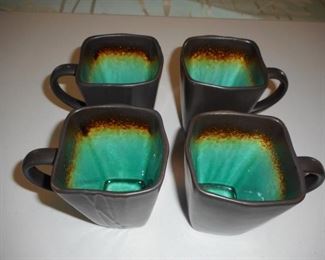 Set of 4 Baum Galaxy Jade pottery coffee mugs - vivid green interior https://ctbids.com/#!/description/share/166741