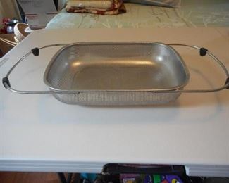 Adjustable over the sink heavy duty strainer, basket 14 x 10.5"         https://ctbids.com/#!/description/share/166744