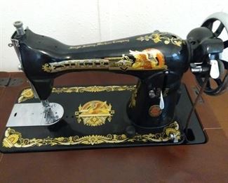 Singer Nostalgia sphinx model 15 sewing machine w/treadle table https://ctbids.com/#!/description/share/167500