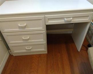 White desk - formica top, wicker look drawers https://ctbids.com/#!/description/share/167581