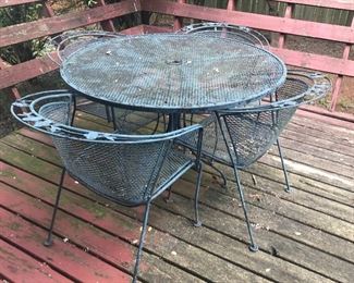 Wrought iron patio table and chairs
