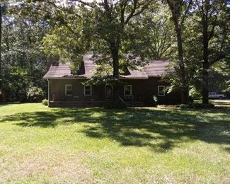 Beautiful 1 1/2 story home on 3 acre lot with outbuilding
