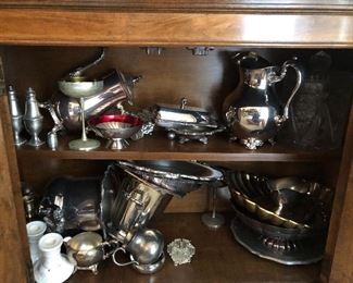 Silverplate serving pieces, champagne buckets, water pitchers