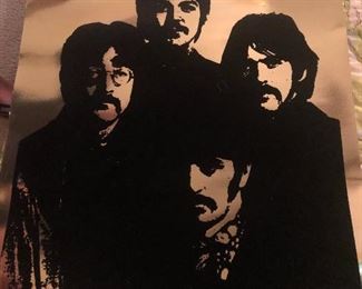Beatles poster.  Silver background, black flocking