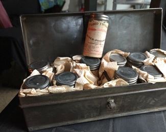 Old metal box with jars of Good Enough