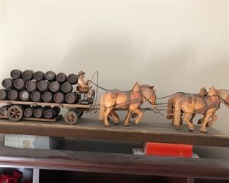 Vintage Anri horse-drawn beer cart with driver and a full load of barrels