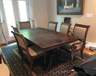 Wooden dining table with 8 chairs