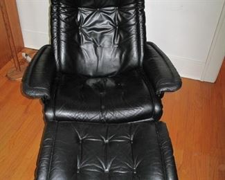 Ekornes leather chair and footstool.