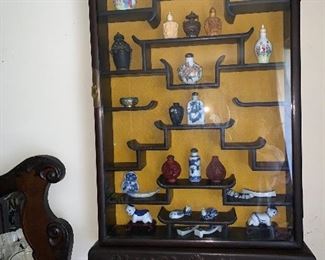 Rosewood wall mounted curio cabinet