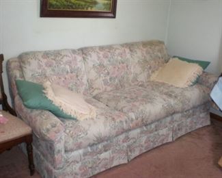 Nice sofa with a pastel floral print.