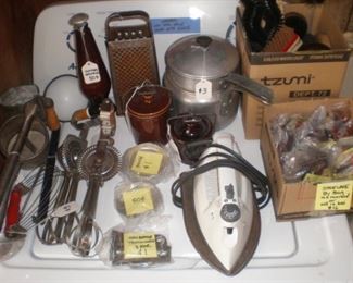 Egg beaters, potato ricer, pie crust mixer, ladles, sprinkling bottle, grater, double boiler, iron, shoe laces, brushes.