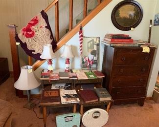 Dresser lamps, scales, marble top end tables, chest of drawers, hooked rug, boy scout items, flags, antique William McKinley, Roosevelt and other presidental books.