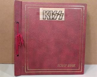 Kiss scrap book..Actual newspaper cut outs and more from the 70's....Very Cool Item..