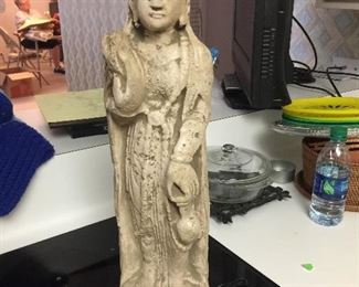 Striking oriental statue