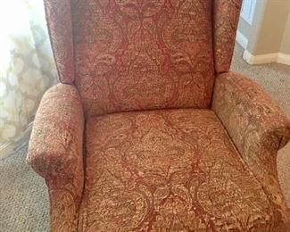 Upholstered Queen Ann style recliner