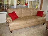 Leather sofa with matching arm chair.