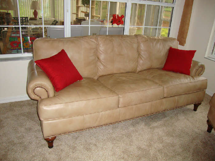 Leather sofa with matching arm chair.